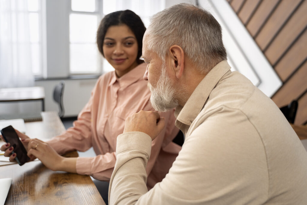 senior-person-school-class-with-smartphone